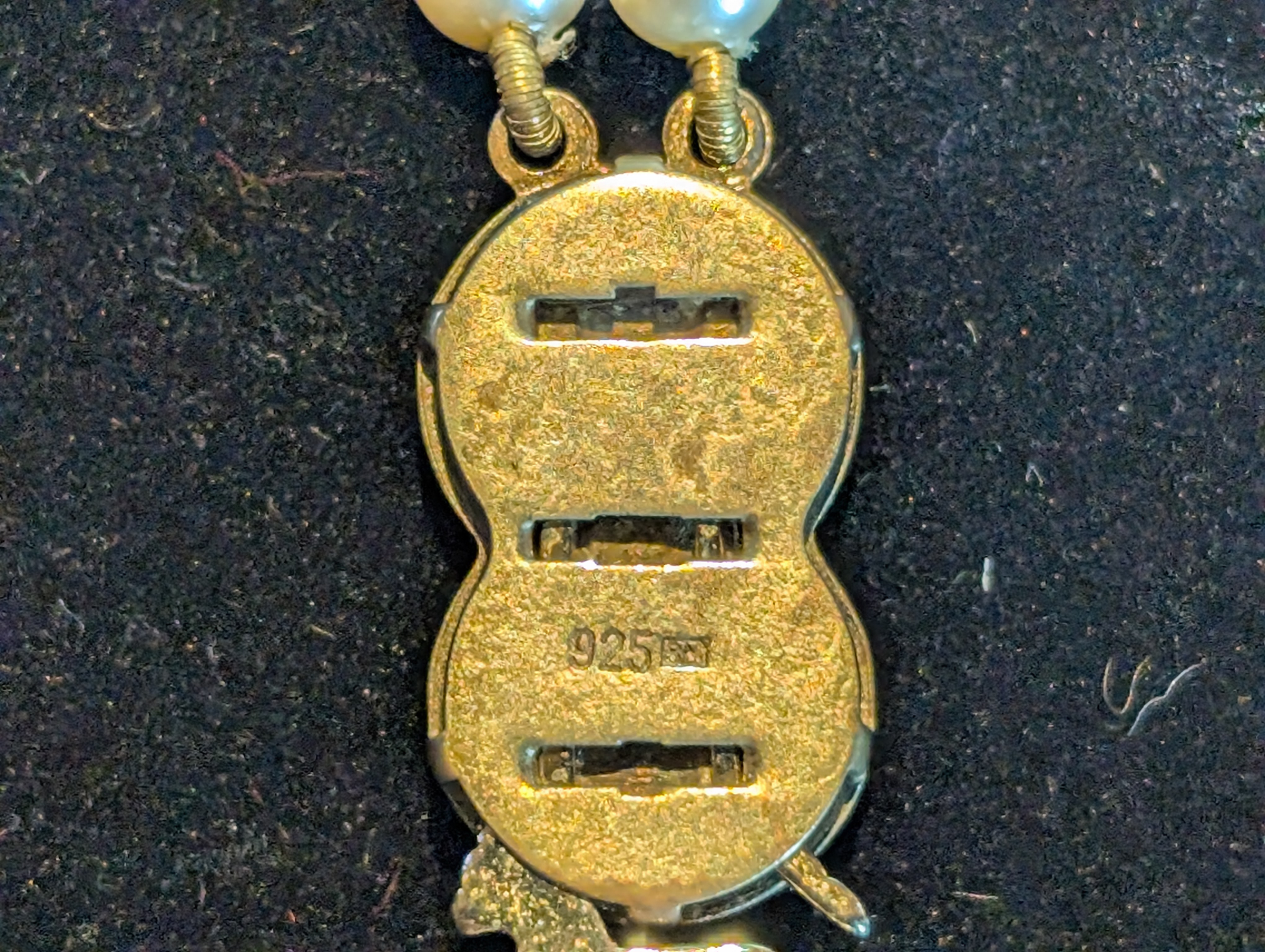 necklace clasp reverse marking