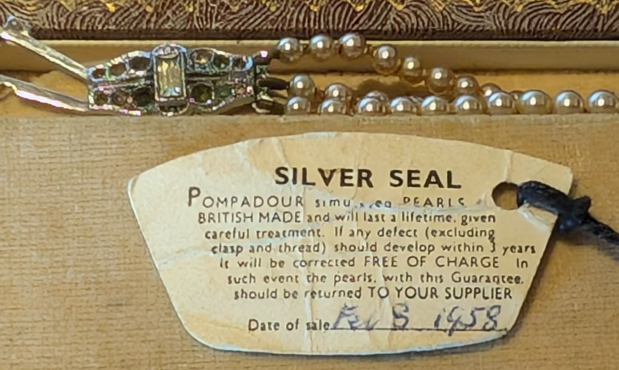 necklace clasp and receipt